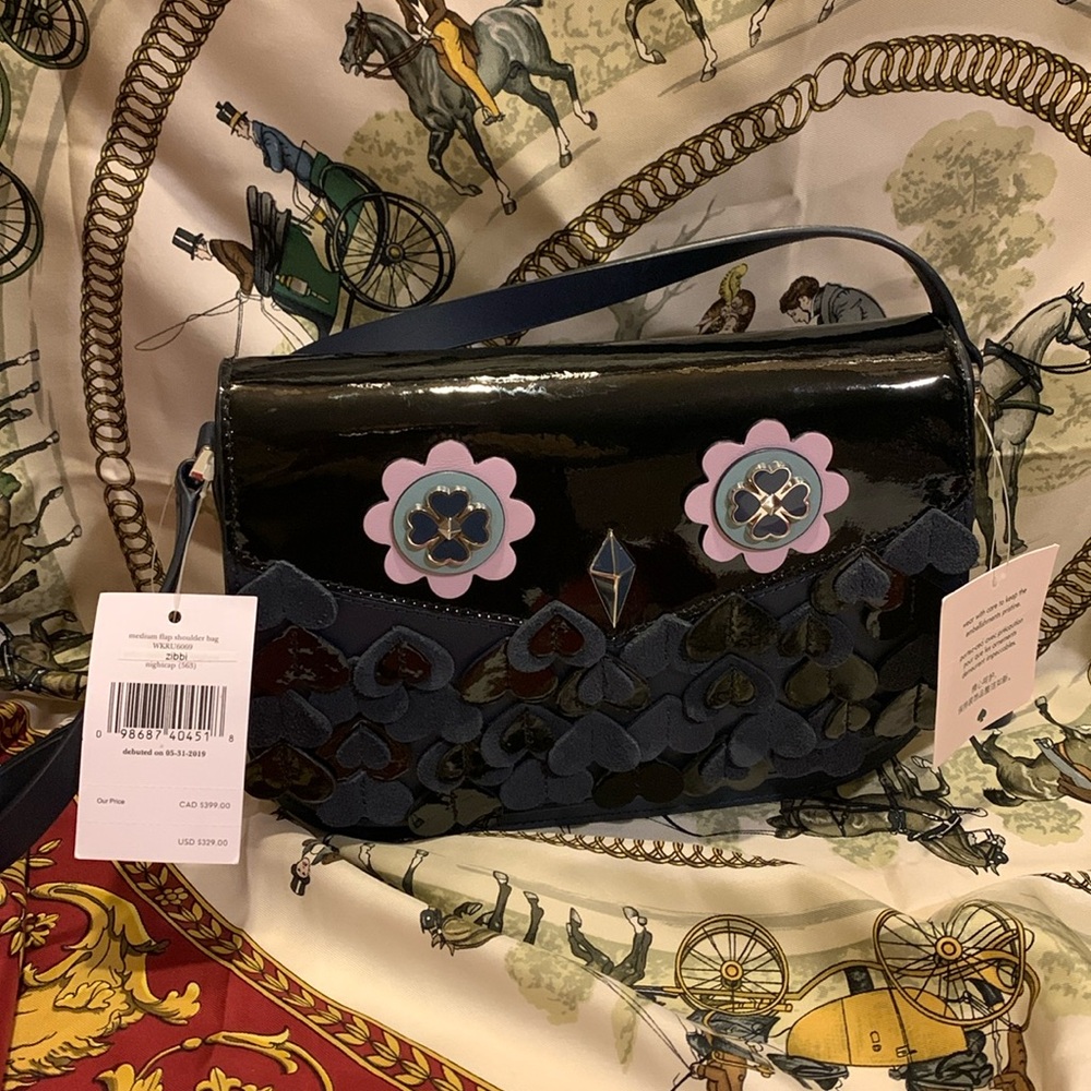 NWT this comes with all tags hang and Kate spade card
